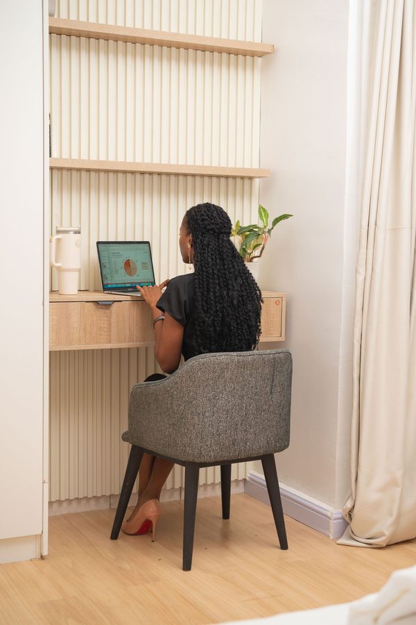 Teacher reviewing learning progress from a private desk